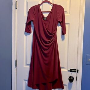 Pink dress. Mid length. 3/4 sleeves. Only worn once.
